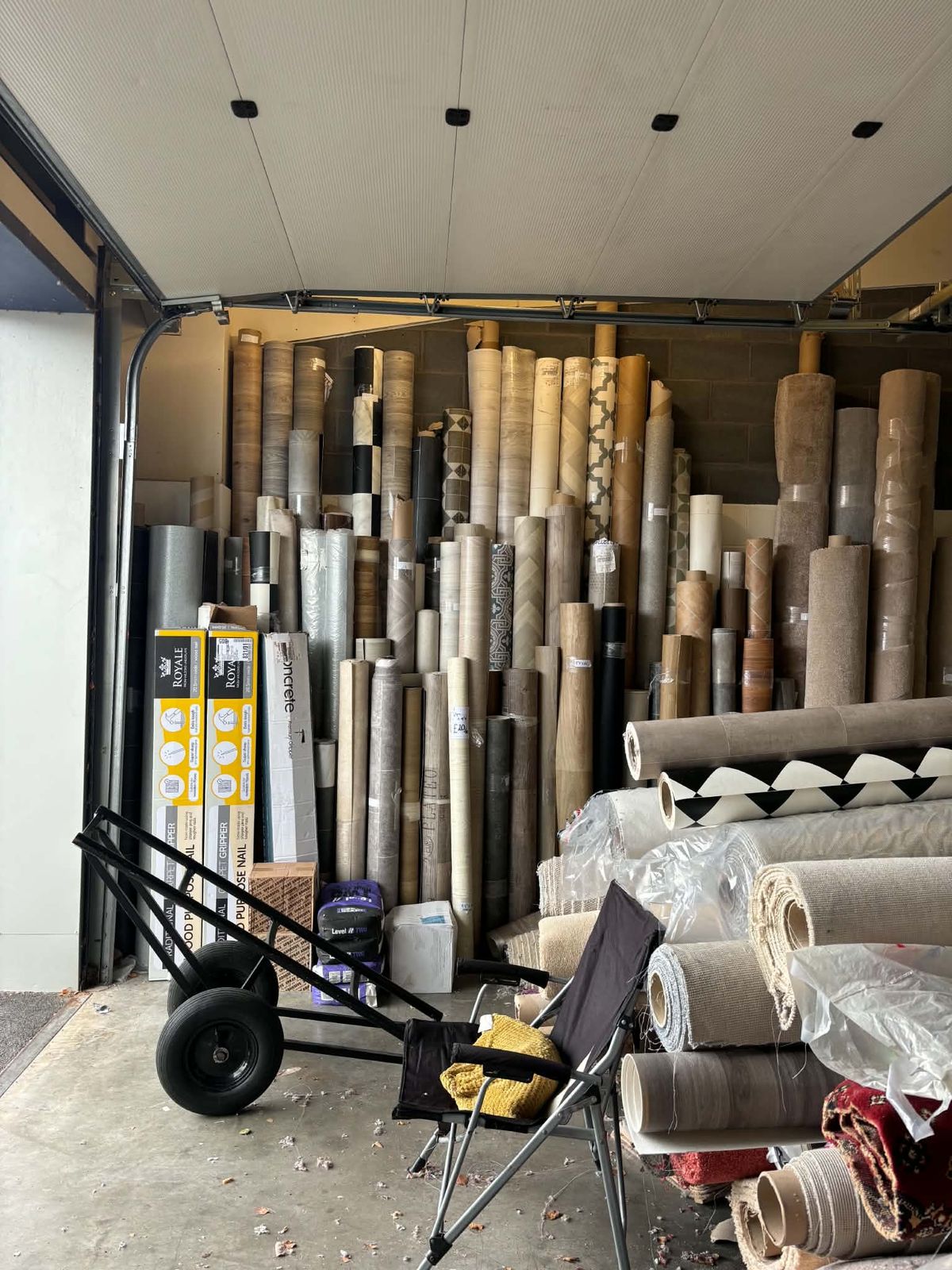 The unit packed with carpet and vinyl rolls
