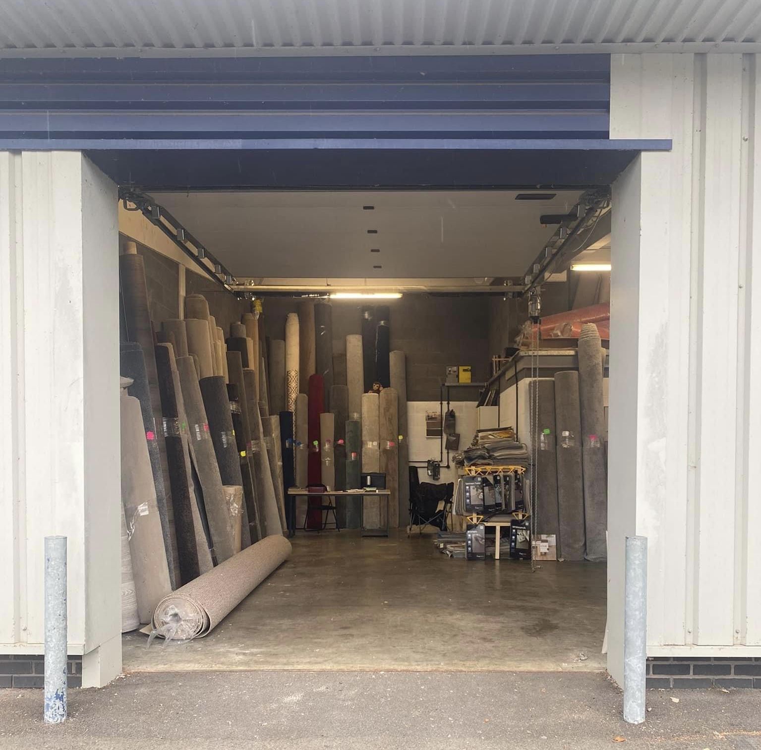 The open roller door of the Your floor unit with rolls inside